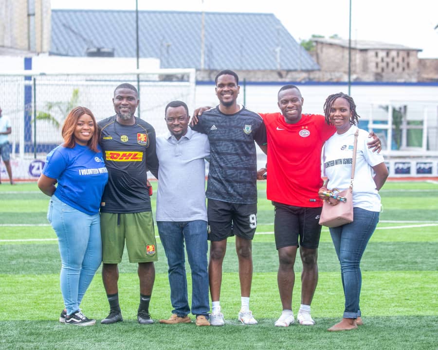 Members of ISMIS pose with Ex- Ghanaian football Stars after a free football match.